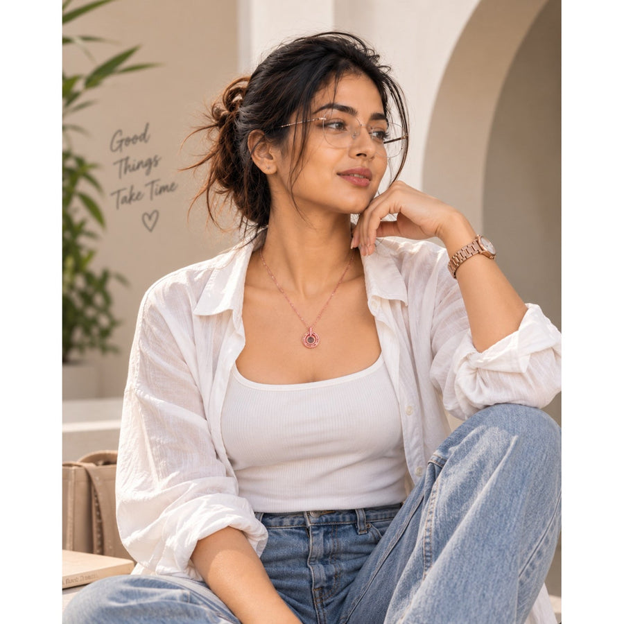 Woman wearing a rose gold circular pendant necklace