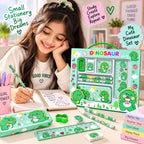 Child using a mint green dinosaur stationery set at a study desk