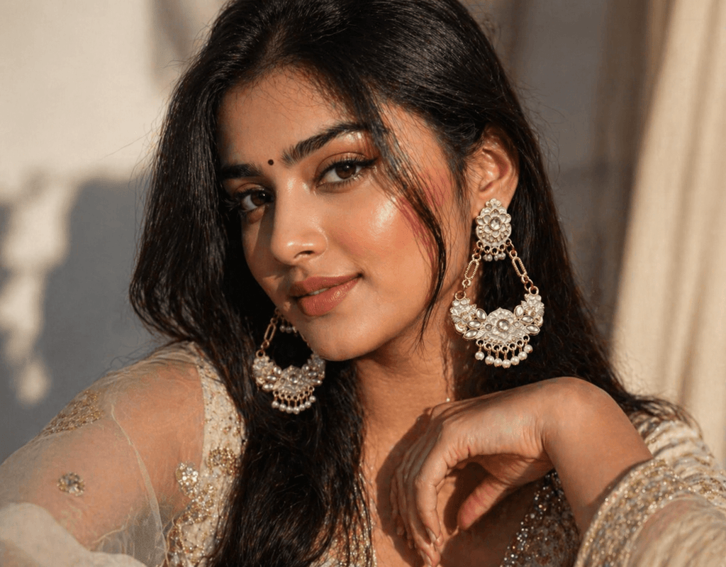 Gold-plated kundan chandbali earrings with pearl drops and circular motifs