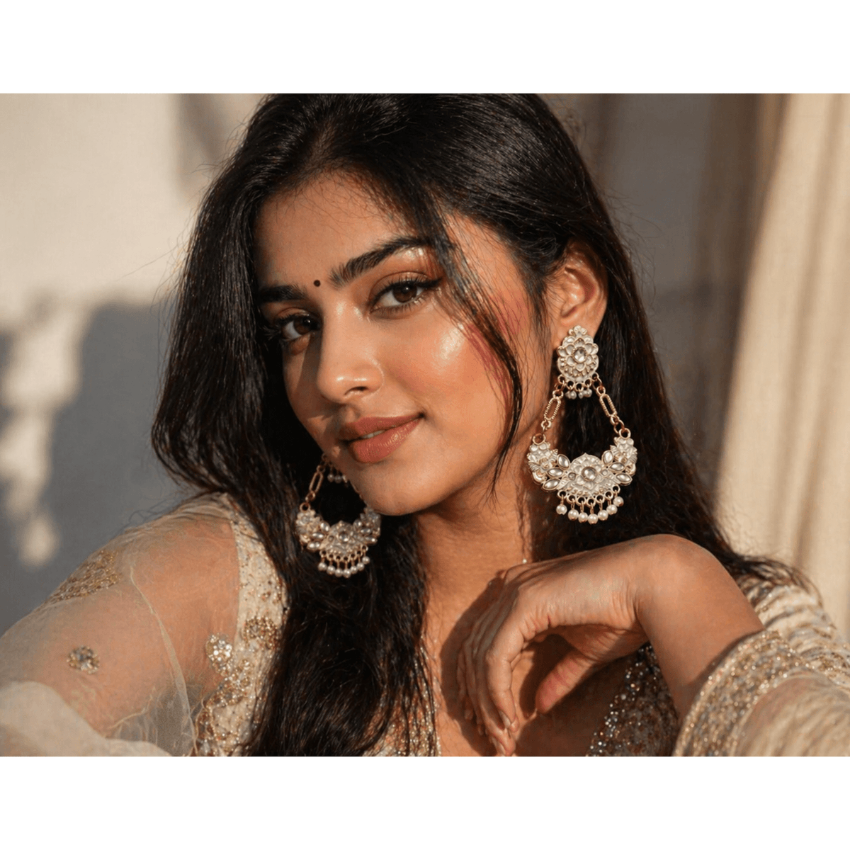 Gold-tone kundan pearl chandbali earrings with circular chandelier drops