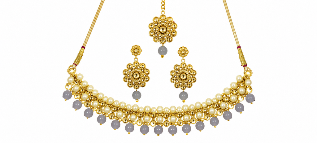 Gold-plated pearl choker necklace set with matching earrings and maang tikka, pearl and bead fringe