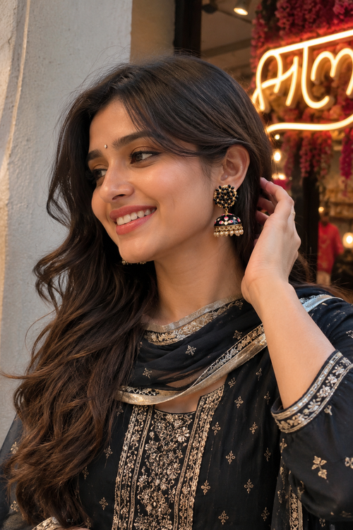 Black Meenakari Pearl Jhumka Earrings for Women - Floral Design - Jhumka earrings on wearer: black bell with gold trim and multicolor bead drops