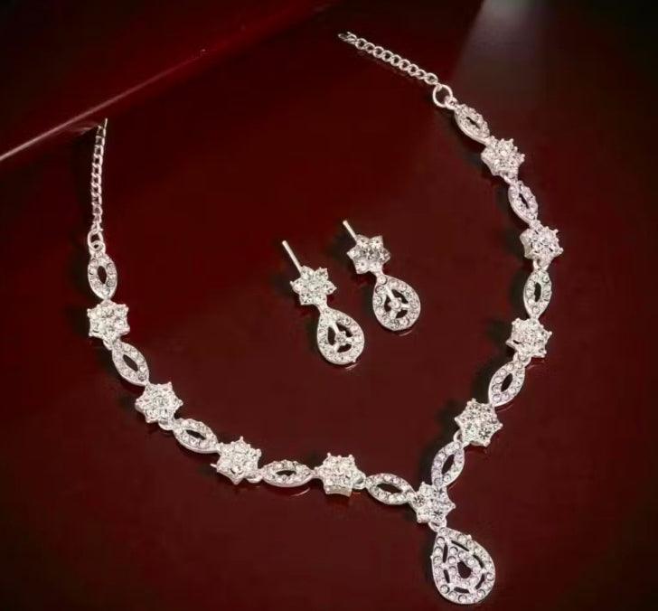 Elegant American diamond floral necklace set with matching earrings for women, perfect for ethnic and party wear.