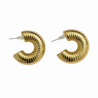 Gold ribbed C-hoop earrings, chunky scalloped texture