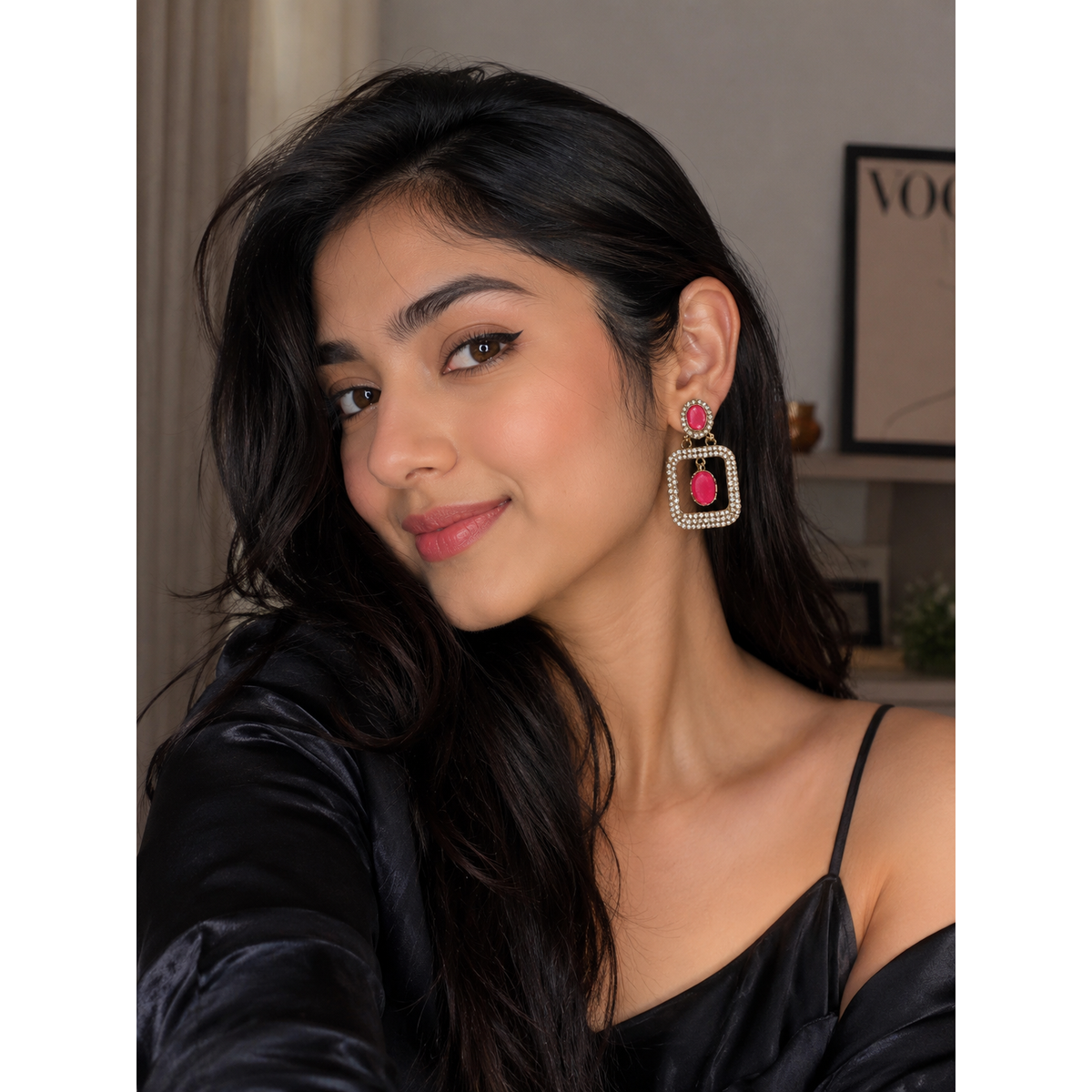 Pink oval drop earrings with rhinestone square frames and gold-tone hook, on model