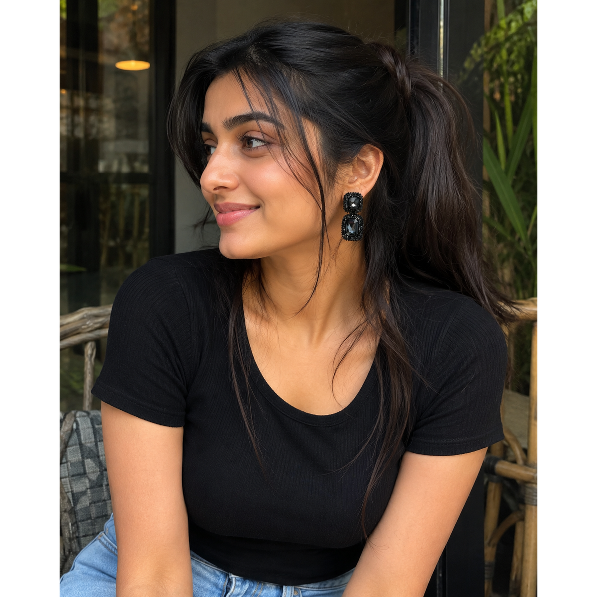 Black Crystal Hand-Beaded Drop Earrings for Women - Black crystal drop earrings worn by a woman with a black top