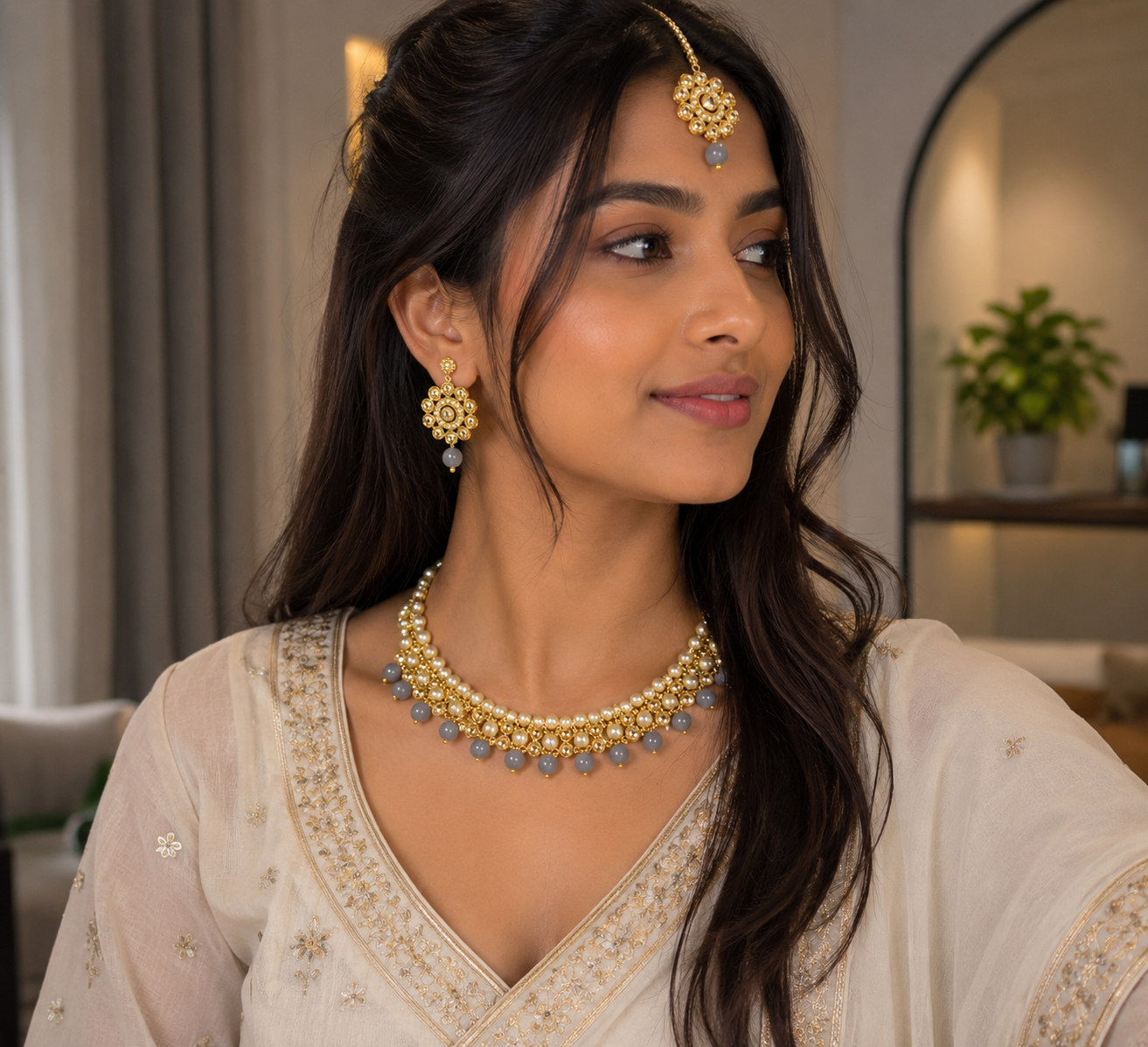 Gold-plated pearl choker set with earrings and maang tikka, gold-tone with blue bead accents