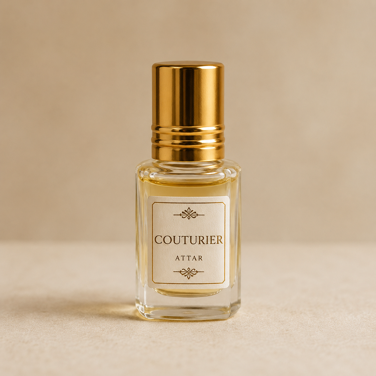 Couturier Premium Unisex Attar - 6 ml - Couturier Attar perfume bottle, clear glass with gold cap and front label