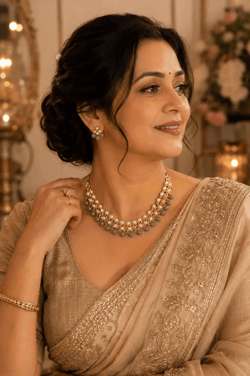 Grey pearl kundan choker necklace and matching stud earrings on model