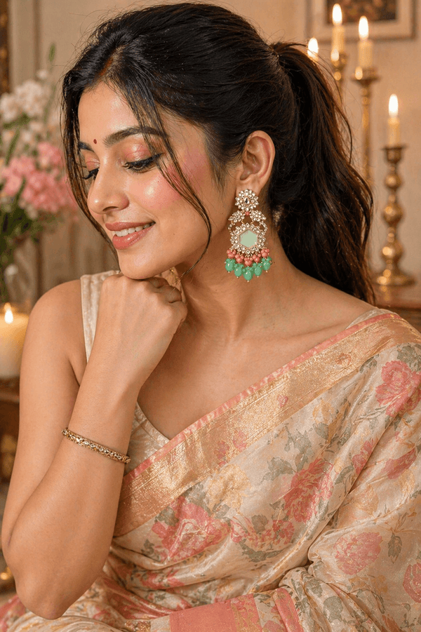 Mint green Kundan Chandbali earrings with coral beads, ethnic statement jewelry for women by Couturier Design.