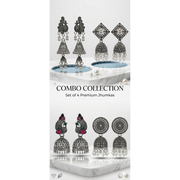 Set of four silver oxidized jhumka earring pairs with pearl and stone dangles