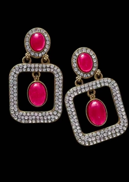 Pink oval stones in square drop settings with clear rhinestone borders, gold-tone hooks