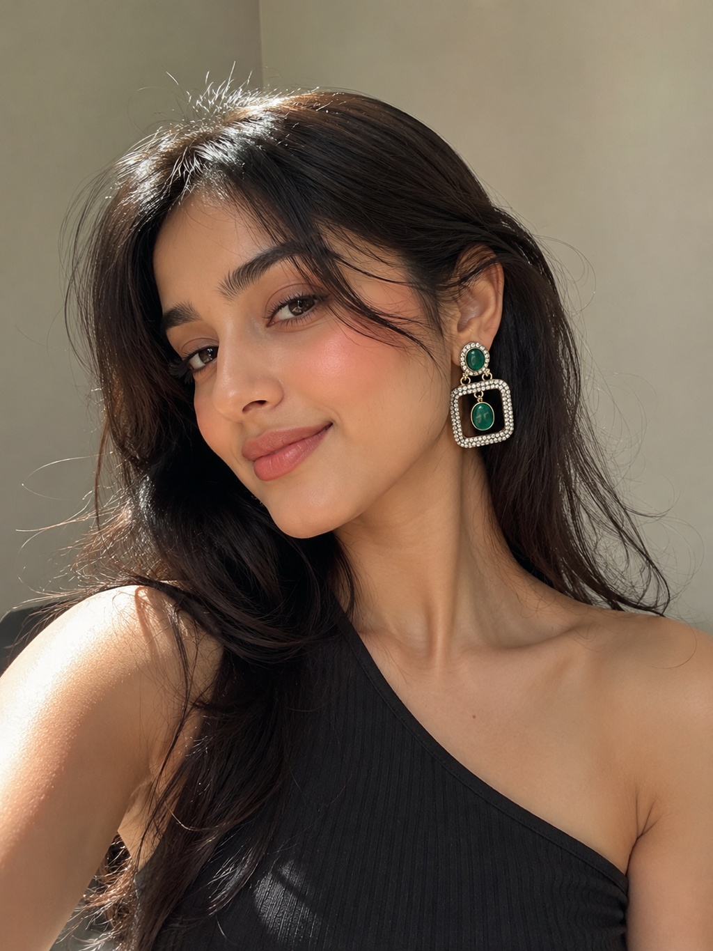 Crystal square drop earrings with emerald-toned center and rhinestone border