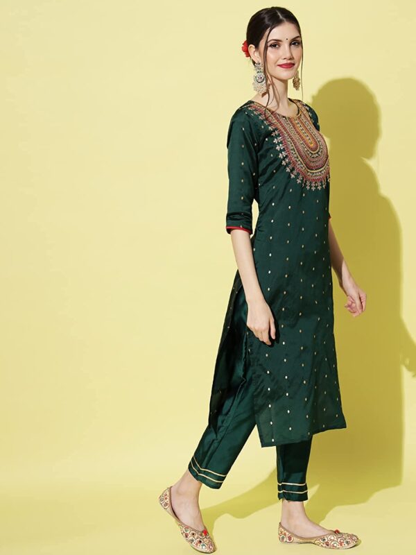 A woman wearing a Silk Blend Embroidered Straight Kurta & Trousers Pant with Dupatta.