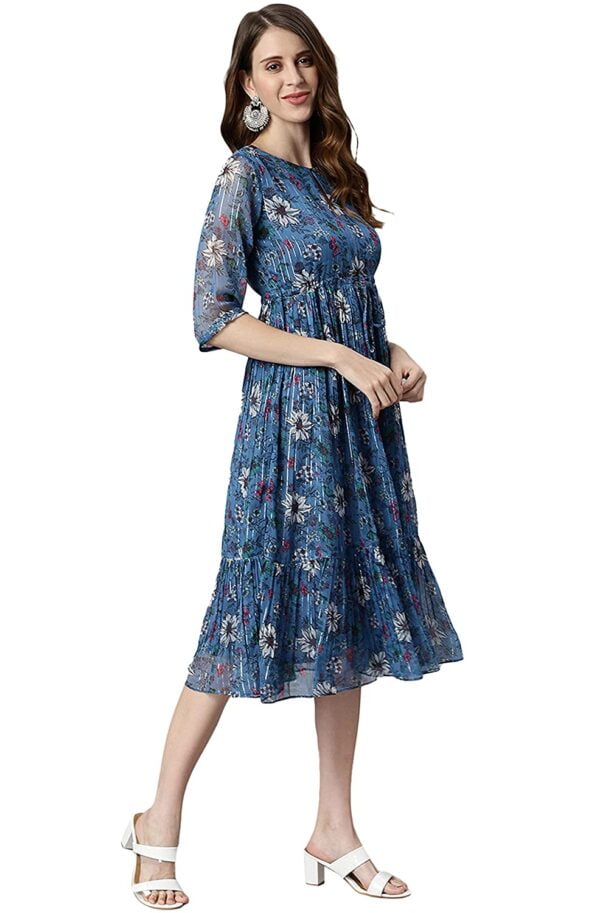 A woman wearing a Blue Poly Georgette Floral Flared Western Dress.