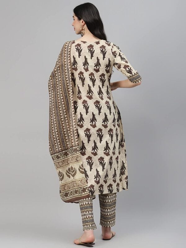 A woman wearing a Cotton Printed Straight Kurta with Palazzo Pants & Dupatta Set.