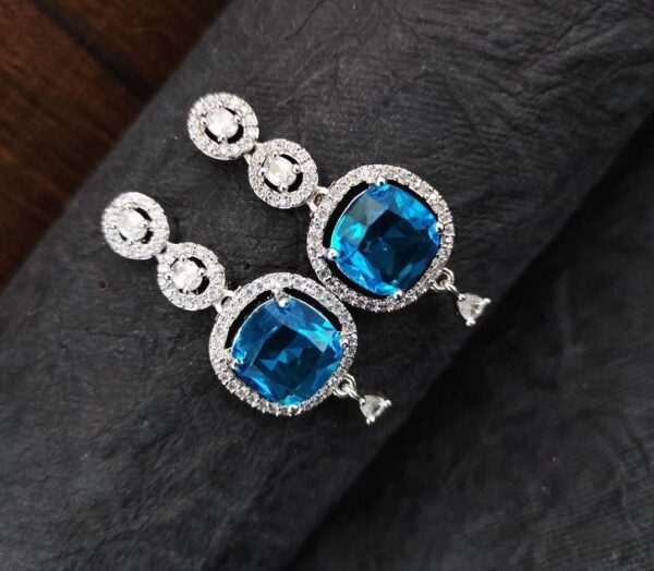 American Diamond Studded Handcrafted Oval Shaped Drop Earrings For Girls and Women - Blue